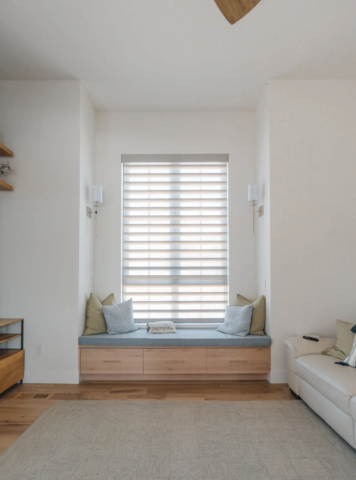 Window seat with drawers below and plantation shutters above